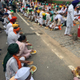 Protesting farmers eating lunch outside the national parliament.